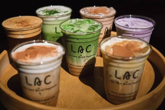 Tray of Lạc Coffee drinks — Vietnamese coffee, matcha, and ube — batched for an event